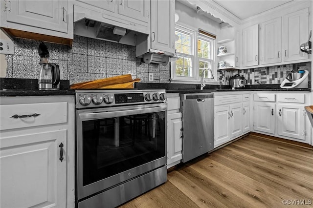 2704 Greenway Ave, Henrico, VA 23228 - kitchen featuring appliances with stainless steel finishes, dark countertops, and white cabinetry