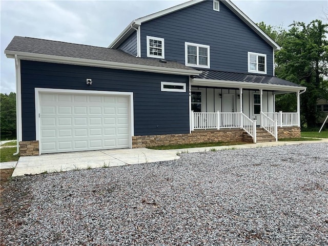 1506 Old Poole Rd, Alberta, VA 23821 - view of front of property with board and batten siding, a porch, a garage, and gravel driveway