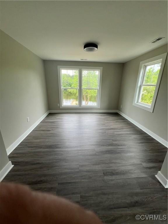1506 Old Poole Rd, Alberta, VA 23821 - empty room with visible vents, baseboards, and dark wood-style floors