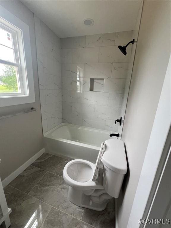 1506 Old Poole Rd, Alberta, VA 23821 - bathroom featuring toilet, baseboards, and shower / tub combination