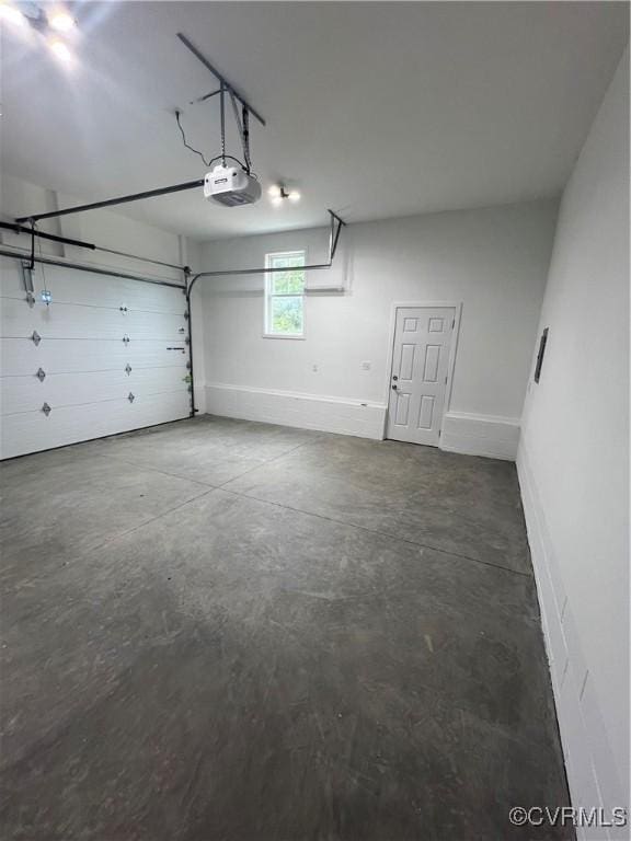 1506 Old Poole Rd, Alberta, VA 23821 - garage featuring baseboards and a garage door opener