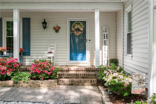 entrance to property with covered porch