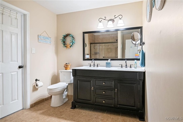 full bathroom with a shower stall, toilet, double vanity, and tile patterned floors