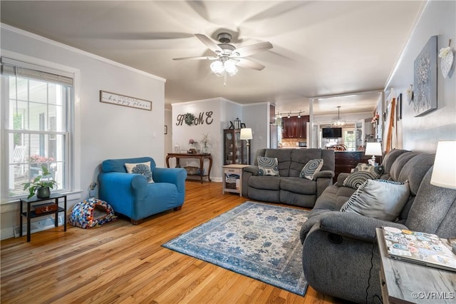 living room featuring ceiling fan and wood finished floors