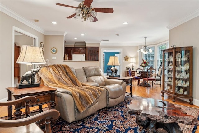 2410 Walhala Dr, North Chesterfield, VA 23236 - living area featuring light wood-style flooring, a ceiling fan, recessed lighting, a chandelier, and ornamental molding