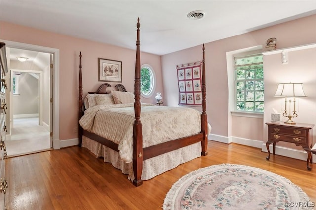 2410 Walhala Dr, North Chesterfield, VA 23236 - bedroom with light wood-style flooring, multiple windows, and baseboards