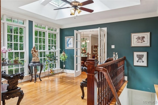 2410 Walhala Dr, North Chesterfield, VA 23236 - sitting room with a skylight, ceiling fan, wood finished floors, ornamental molding, and french doors