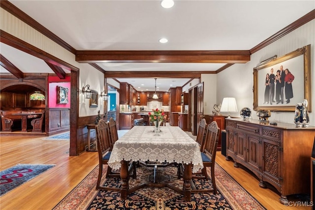 2410 Walhala Dr, North Chesterfield, VA 23236 - dining space featuring light wood-type flooring, beam ceiling, crown molding, and wainscoting