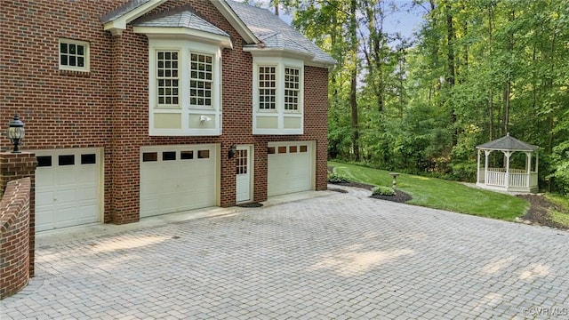 2410 Walhala Dr, North Chesterfield, VA 23236 - garage featuring decorative driveway
