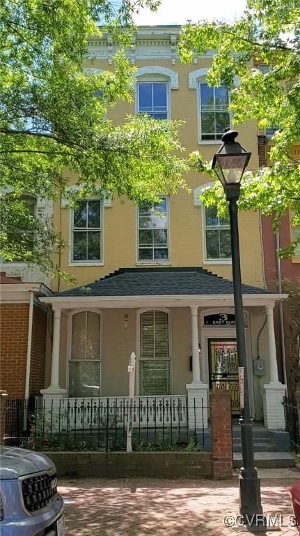 3 E Clay St, Richmond, VA 23219 - view of front of house featuring covered porch and stucco siding