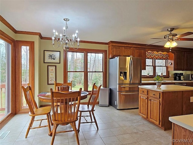 12448 Whisana Ln, Ashland, VA 23005 - kitchen with stainless steel fridge with ice dispenser, light countertops, light tile patterned floors, a chandelier, and ornamental molding