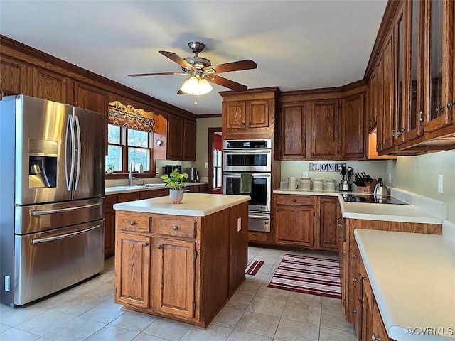 12448 Whisana Ln, Ashland, VA 23005 - kitchen with appliances with stainless steel finishes, a warming drawer, a ceiling fan, a sink, and light tile patterned floors