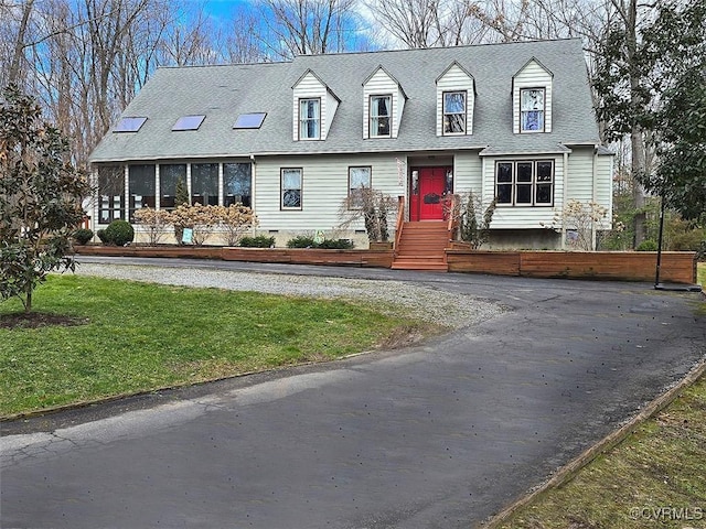 12448 Whisana Ln, Ashland, VA 23005 - new england style home featuring a front yard, a shingled roof, and asphalt driveway