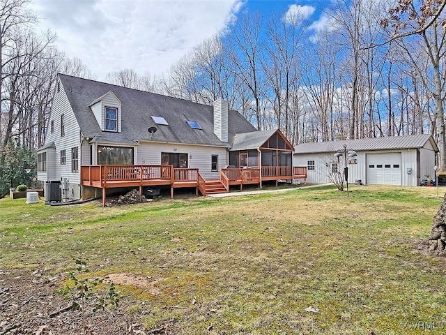12448 Whisana Ln, Ashland, VA 23005 - rear view of property featuring a sunroom, central AC, a chimney, a wooden deck, and a lawn