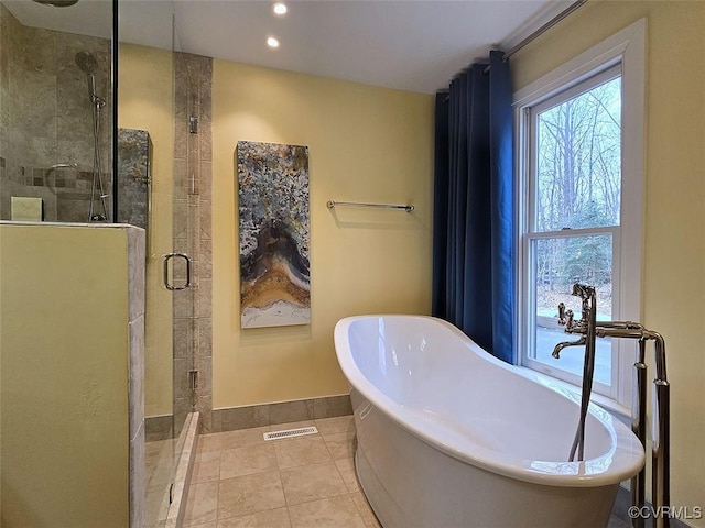 12448 Whisana Ln, Ashland, VA 23005 - bathroom with a stall shower, a freestanding bath, recessed lighting, baseboards, and tile patterned flooring