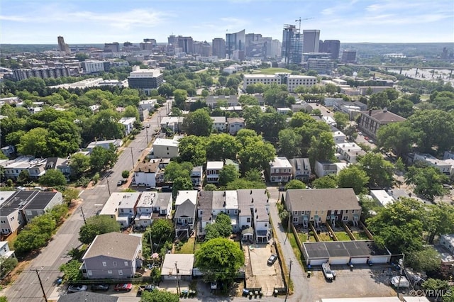 aerial view of property's location featuring nearby urban area