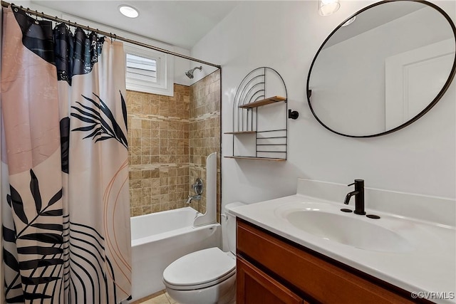 bathroom with vanity, toilet, and shower / bath combination with curtain
