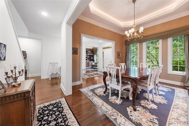 17 E Square Ln, Richmond, VA 23238 - dining area featuring plenty of natural light, a chandelier, baseboards, dark wood-style floors, and crown molding
