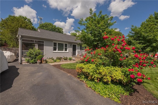 view of front of property featuring brick siding