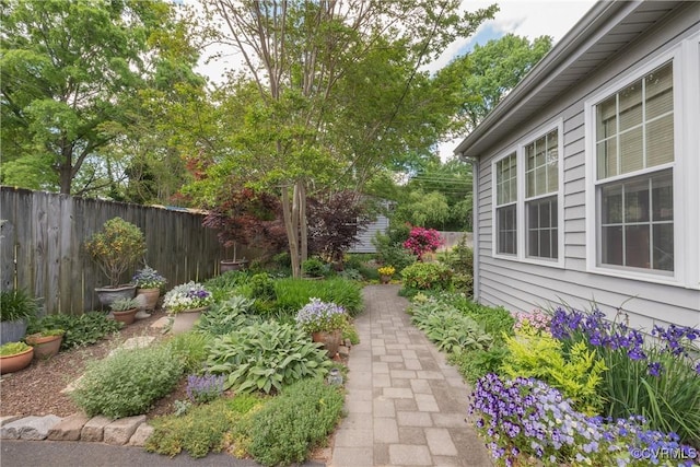 view of yard featuring fence