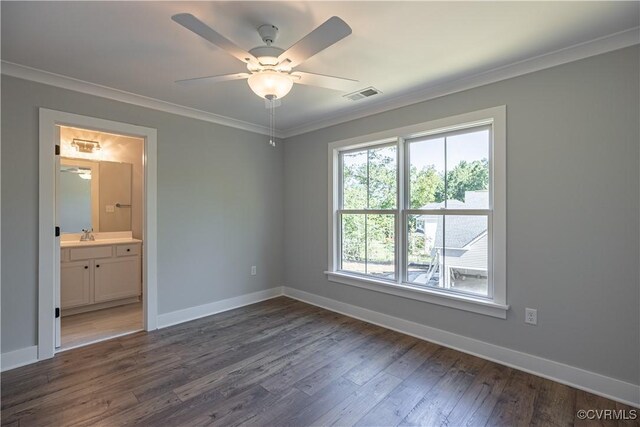 15148 Johns Trace Cir, Montpelier, VA 23192 - unfurnished bedroom with dark wood finished floors, ornamental molding, baseboards, ensuite bath, and ceiling fan