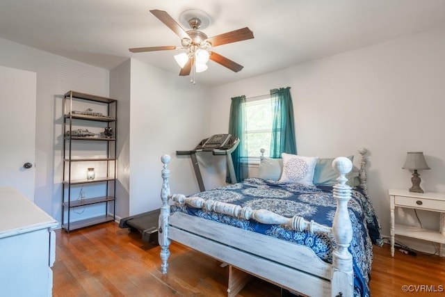bedroom with wood finished floors and ceiling fan
