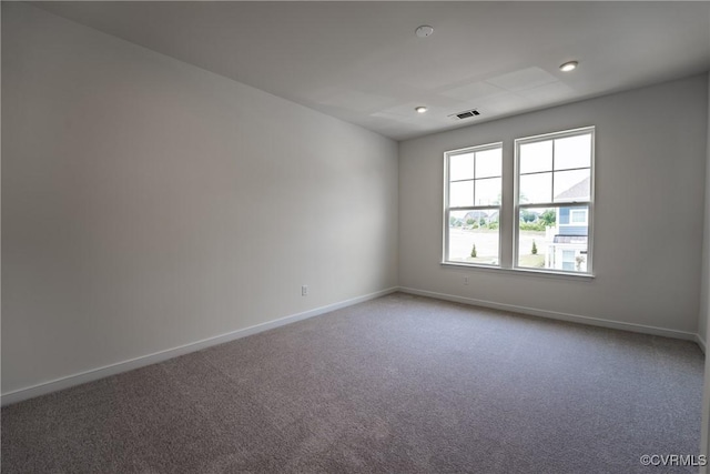 spare room featuring baseboards, carpet floors, and recessed lighting
