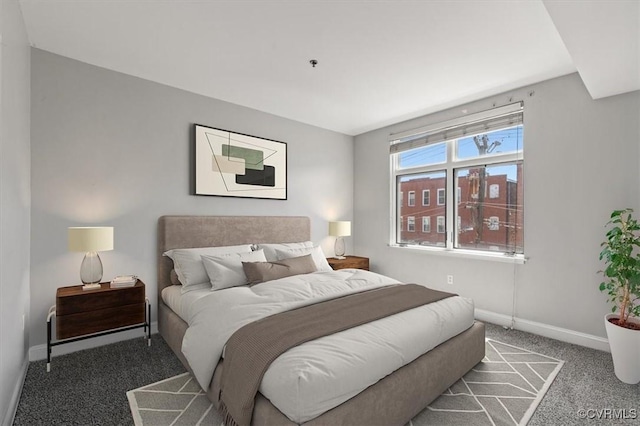 carpeted bedroom with baseboards