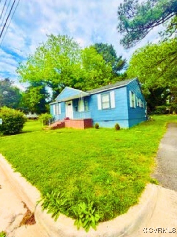 705 Endly St, Chase City, VA 23924 - view of front of house with a front lawn