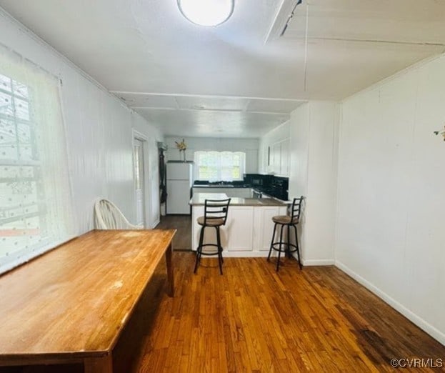 705 Endly St, Chase City, VA 23924 - dining area featuring dark wood finished floors