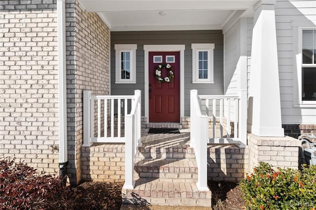 9475 Creek Summit Cir, Richmond, VA 23235 - doorway to property with covered porch and brick siding