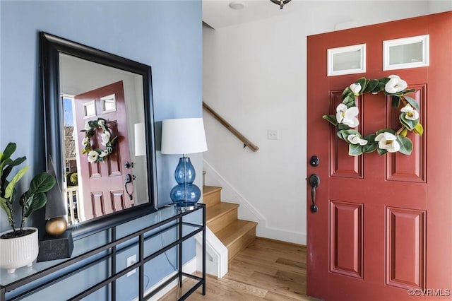 9475 Creek Summit Cir, Richmond, VA 23235 - entrance foyer with light wood-style flooring, stairway, and baseboards