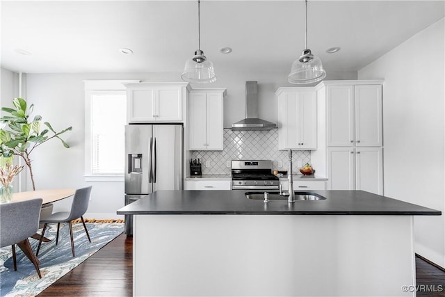 kitchen featuring wall chimney exhaust hood, stainless steel appliances, dark wood-type flooring, white cabinetry, and recessed lighting