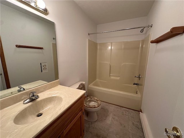full bath with vanity, shower / tub combination, and toilet