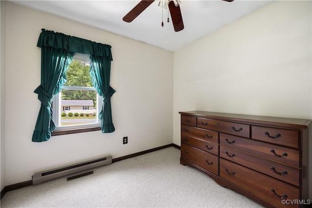 bedroom featuring a baseboard radiator, light carpet, baseboards, and ceiling fan