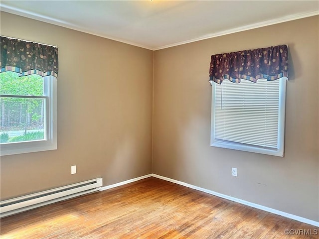 8920 Richard Ln, Rice, VA 23966 - unfurnished room with a baseboard radiator, wood finished floors, baseboards, and crown molding