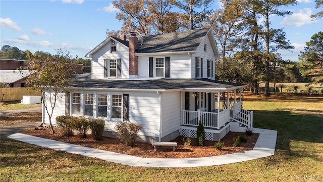 13130 The Glebe Ln, Charles City, VA 23030 - view of home's exterior with covered porch, a chimney, a yard, and a shingled roof