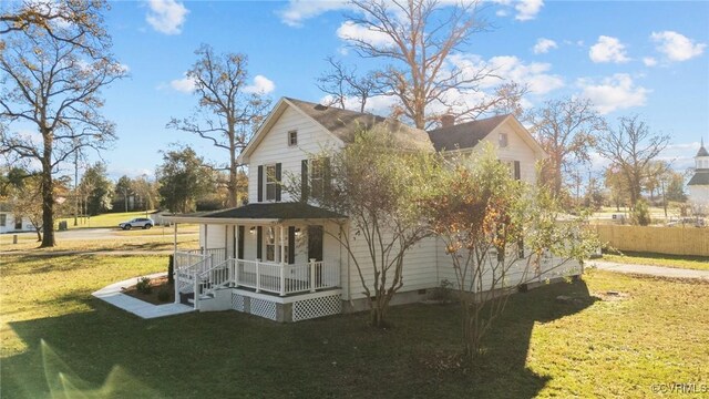 13130 The Glebe Ln, Charles City, VA 23030 - view of property exterior featuring covered porch, a yard, crawl space, and a chimney