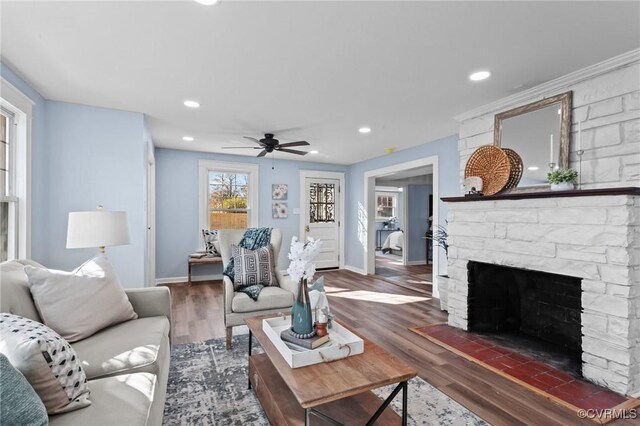 13130 The Glebe Ln, Charles City, VA 23030 - living room featuring a ceiling fan, a stone fireplace, wood finished floors, baseboards, and recessed lighting