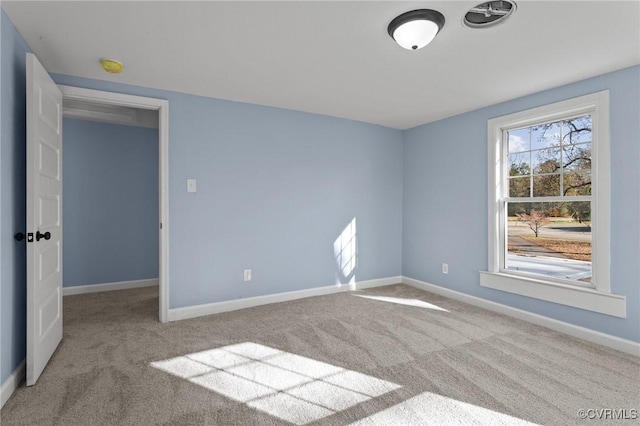 13130 The Glebe Ln, Charles City, VA 23030 - spare room featuring carpet, baseboards, and a smoke detector
