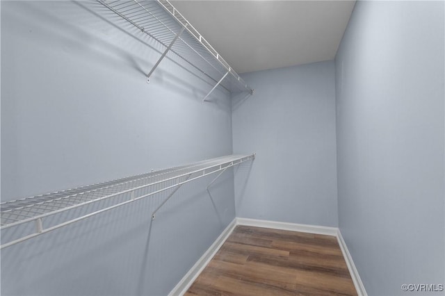 13130 The Glebe Ln, Charles City, VA 23030 - walk in closet featuring wood finished floors