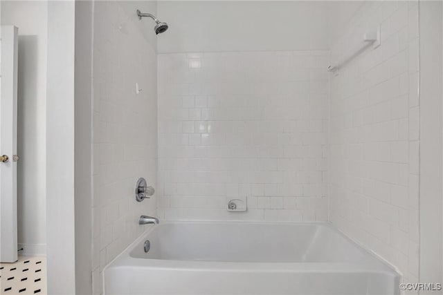 bathroom featuring washtub / shower combination