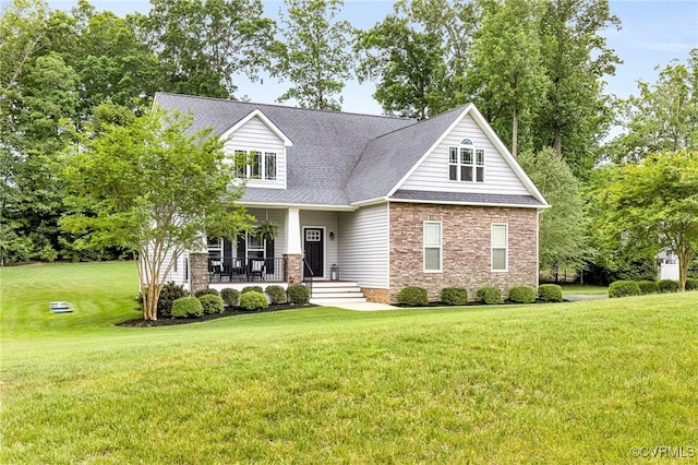 10527 Deerlake Dr, New Kent, VA 23124 - craftsman inspired home featuring stone siding, a porch, a front lawn, and a shingled roof