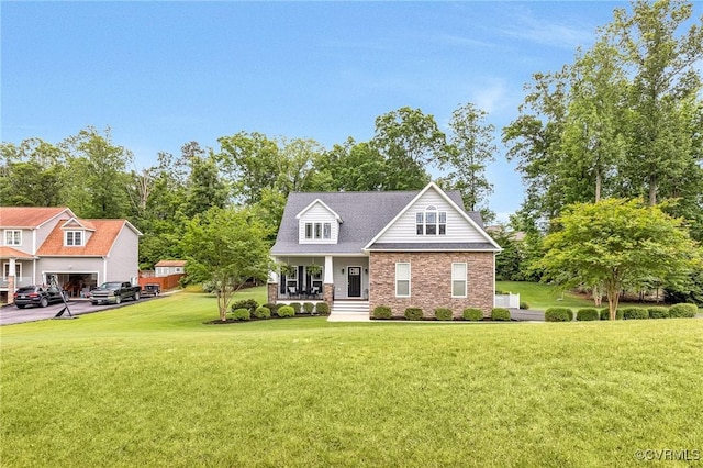10527 Deerlake Dr, New Kent, VA 23124 - view of front of house with a porch, a front lawn, and brick siding