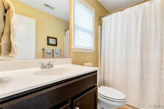 10527 Deerlake Dr, New Kent, VA 23124 - bathroom with vanity, toilet, plenty of natural light, and a shower with curtain