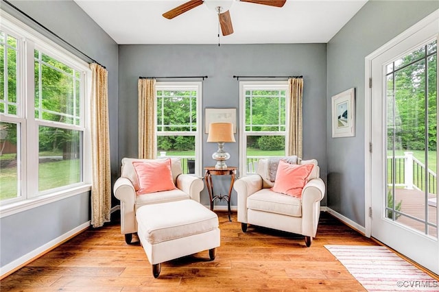 10527 Deerlake Dr, New Kent, VA 23124 - sitting room featuring light wood-style floors, ceiling fan, and baseboards