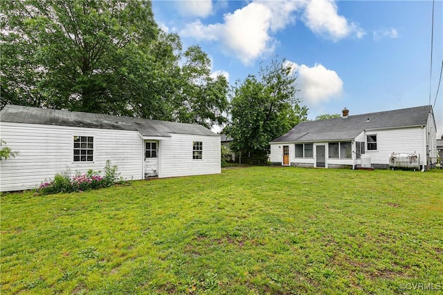 2704 Carlisle Ave, Henrico, VA 23231 - view of green lawn with a sunroom