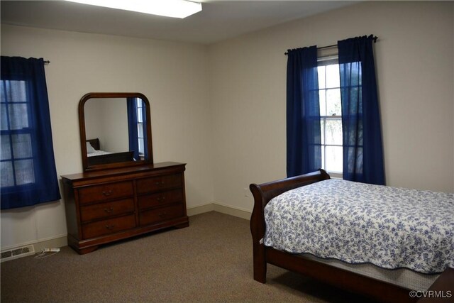 bedroom featuring carpet
