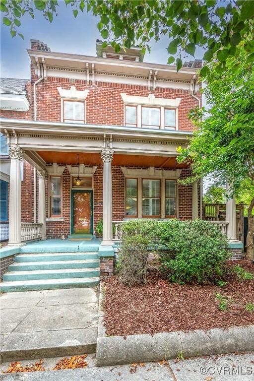 2706 W Grace St, Richmond, VA 23220 - italianate-style house featuring a porch and brick siding