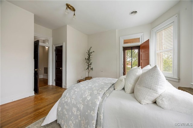 2706 W Grace St, Richmond, VA 23220 - bedroom with wood finished floors and baseboards